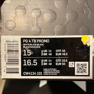 Nike PG 4 PROMO basketball shoe in the white and black colorway